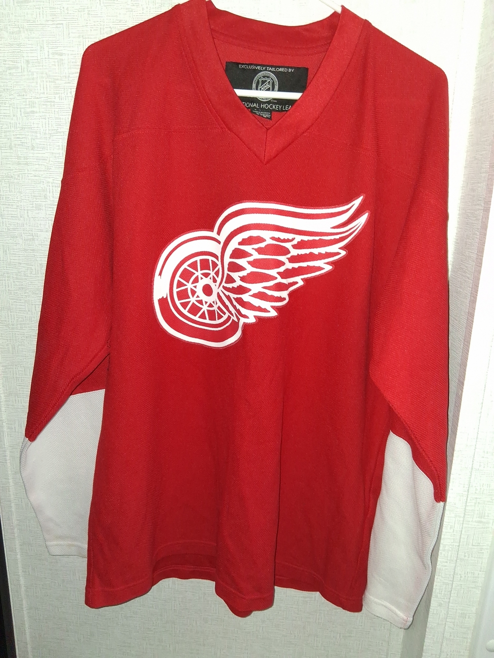 NHL Red Hockey Jersey with White NHL Crest